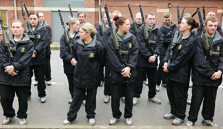 Junior Soldiers: Junior Soldiers collect weapons and bayonets from the Armoury