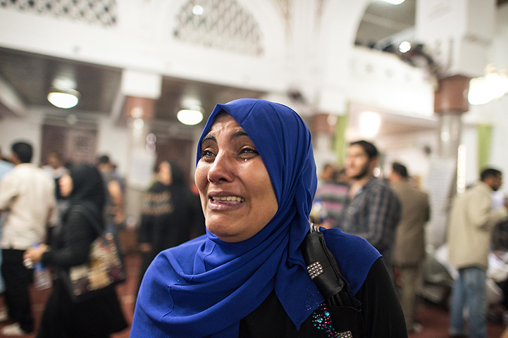 Woman cries in mosque