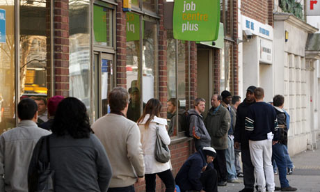 Jobseekers queue outside a Jobcentre Plus branch