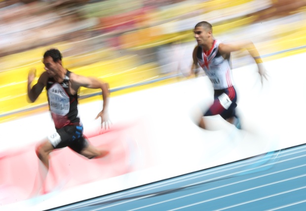 Britain's Adam Gemili (R) competes during the men's 200 metres event at the 2013 IAAF World Championships at the Luzhniki stadium in Moscow, Russia. Photograph: Adrian Dennis/AFP/Getty Images