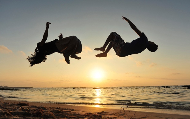 In a picture supplied today Zakaria Alakory (R) and Assem Al Khshmy 16, practice parkour on the beach in Benghazi, Libya. Photograph: Esam Omran Al Fetori/Reuters