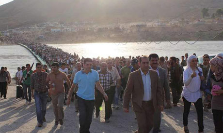 Thousands of refugees cross from Syria into Iraq at Peshkhabour