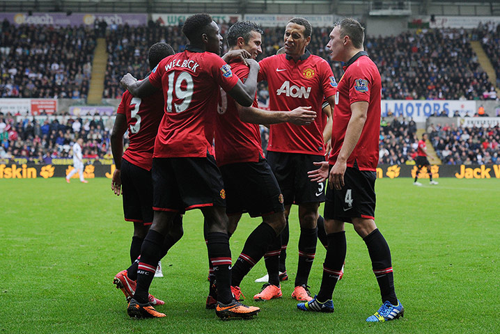 Swansea v United: Robin van Persie is congratulated after scoring the 3rd goal