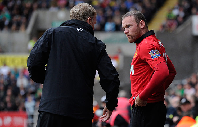 Swansea v United: David Moyes talks to Wayne Rooney as he brings him on as a substitute 