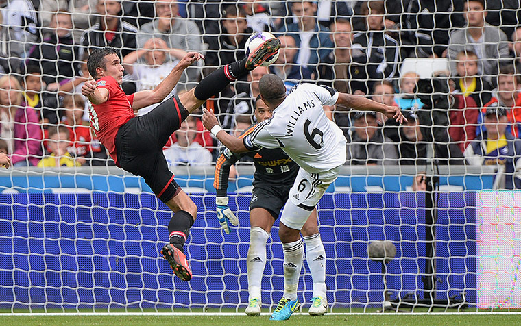 Swansea v United: Robin Van Persie scores the opening goal 
