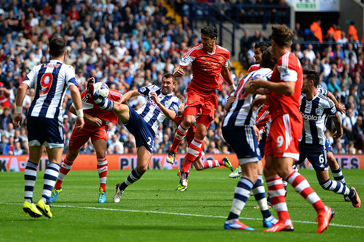 saturday round-up: West Brom's Gareth McAuley clears the ball from the danger area