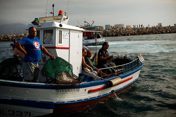 Gibraltar protests: Spanish fishermen with their relatives in a fishing boat