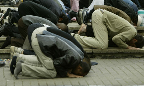 Muslims pray at the Central London mosque
