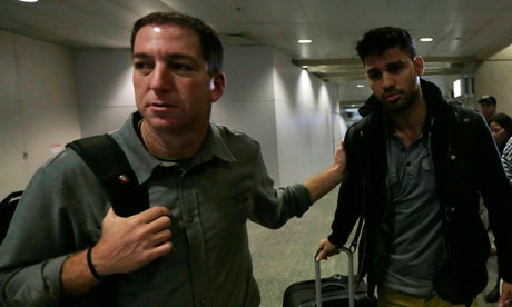 Glenn Greenwald, left, with David Miranda, who was held for nine hours at Heathrow under schedule 7 of Britain's terror laws. Photograph: Ricardo Moraes/Reuters