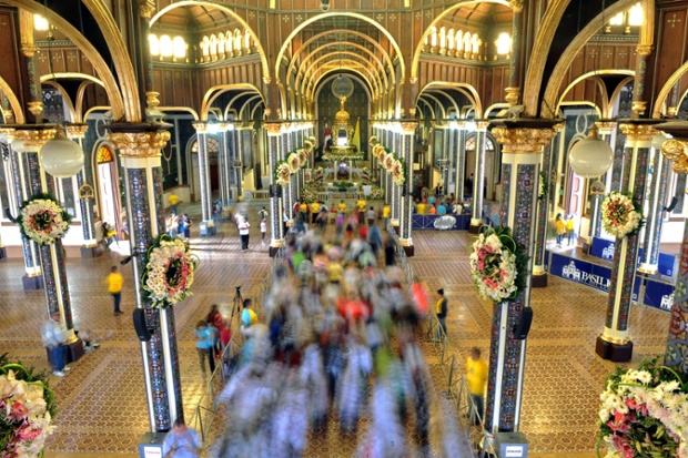 Pilgrims enter at Our Lady of the Angels Basilica in Cartago, Costa Rica to pay tribute to Virgen de los Angeles (Virgin of the Angels).