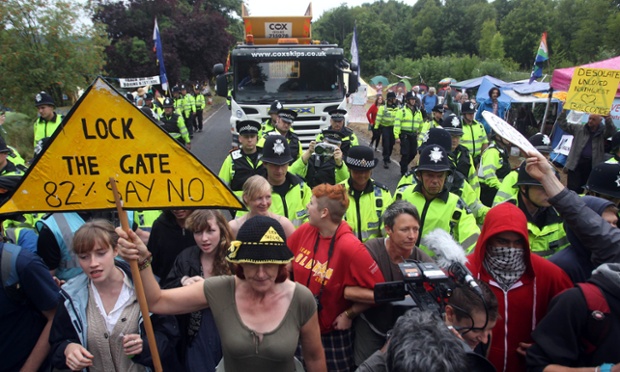 Protesters attempt to slow vehicles down that are arriving at the Balcombe fracking site in West Sussex as energy company Cuadrilla has started testing equipment ahead of exploratory oil drilling in the English countryside as anti-fracking protests at the site entered a ninth day.