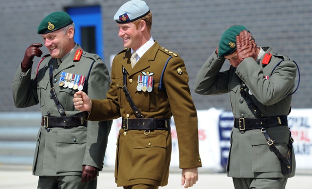 Prince Harry keeps the top brass laughing as he visits Royal Marines Tamar, the Naval Base in Devonport, England. Prince Harry was there to open the new £30M Royal Marines centre of amphibious excellence.