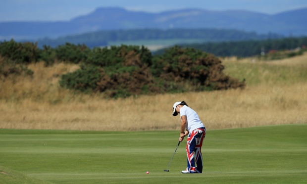 Jeong Jang of Korea (in Union Jack trousers?) putts on the 4th green during the second round of the Ricoh Women's British Open at the Old Course, St Andrews on a beuatiful day in Scotland.