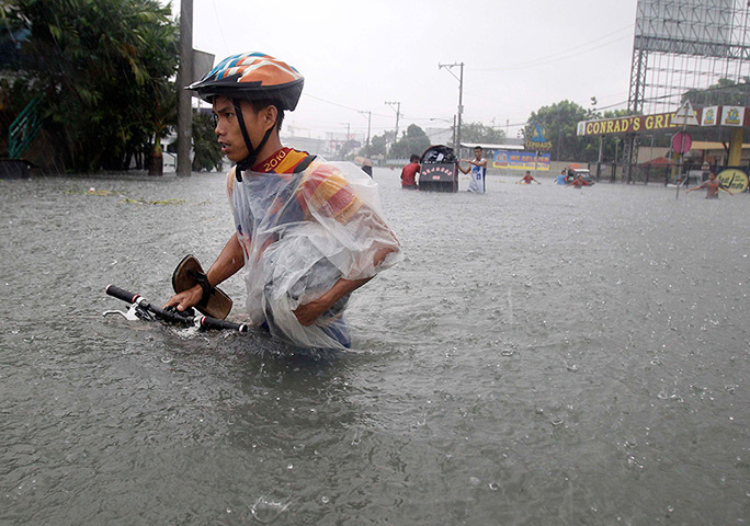 Manila floods: Heavy rains have been intensified by tropical storm Trami, in Pasay city