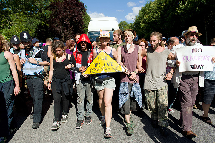 Fracking protest: Climate and anti-fracking activists block the road in front of a tanker to 