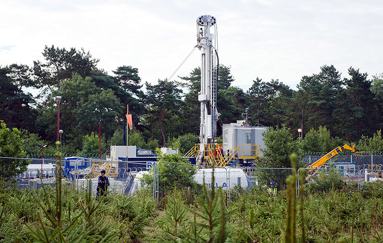 Fracking protest: A police officer stands guard on the perimeter of the test drill site