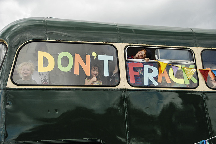 Fracking protest: Children in an old double-decker bus go for a tour around Balcombe