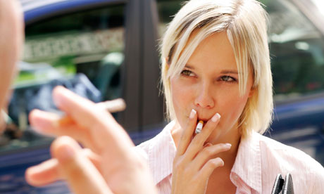 people smoking outside their office