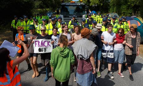 Anti-fracking protesters at Cuadrilla's site in Balcombe attempt to block the road