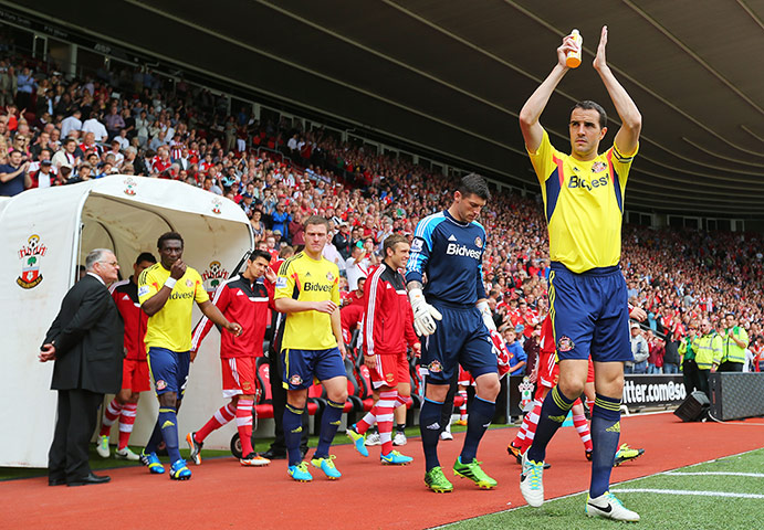 saturday round up 3: Sunderland captain John O'Shea applauds the travelling Sunderland fans