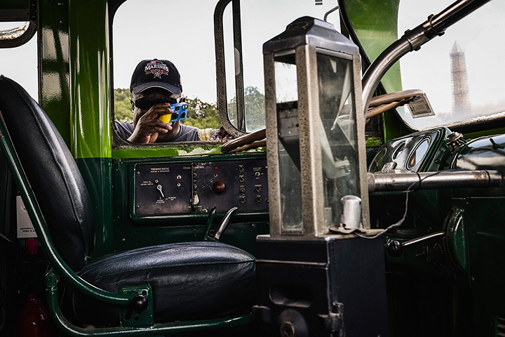Weekend in pictures: Washington, USA: A man photographs the interior of a once-segregated antiqu