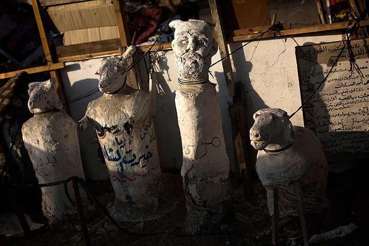 Weekend in pictures: Cairo, Egypt,: Sculptures representing ousted Egypt's President Mohamed Mor