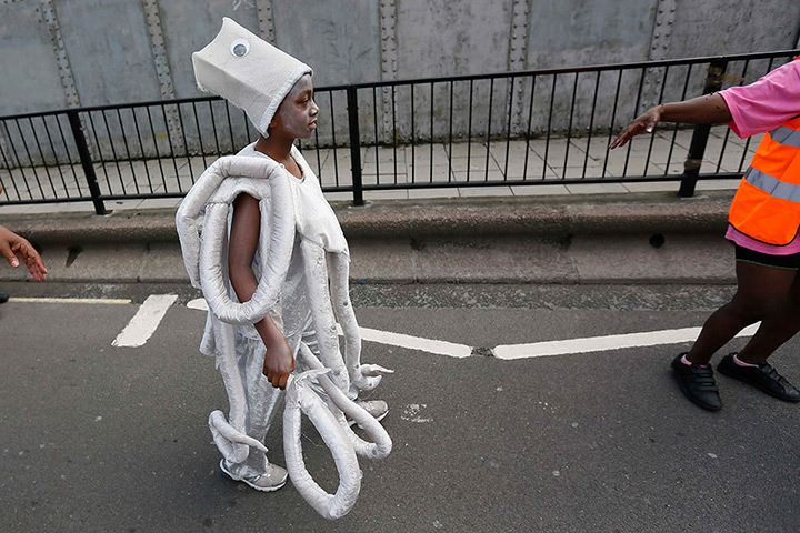 Notting Hill carnival: A young boy participates in the children's day parade