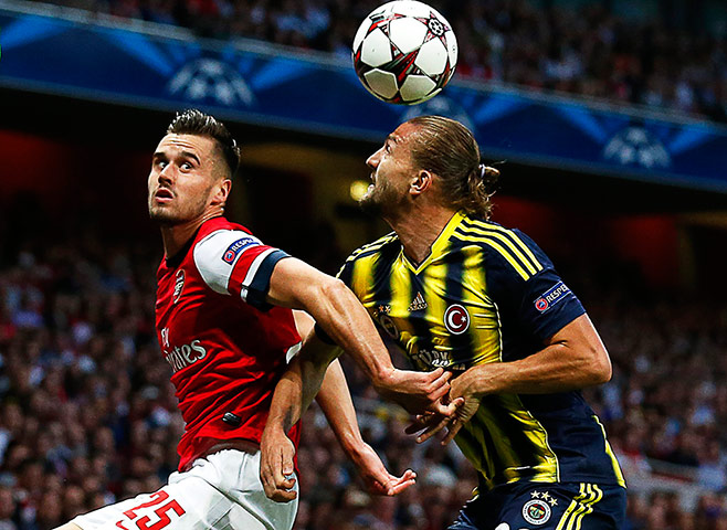 arsenal: Carl Jenkinson keeps an eye on Caner Erkin