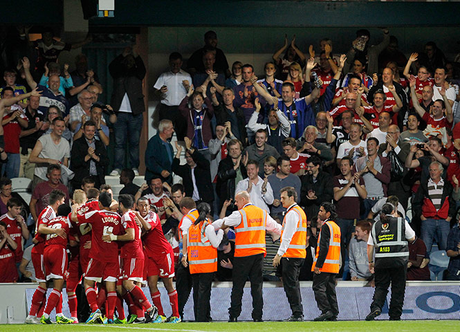 capital one cup: Alex Pritchard (hidden) celebrates with team mates