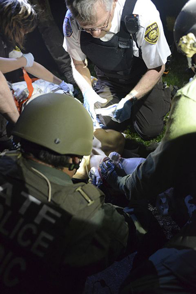 Boston Marathon pics: Dzhokhar Tsarnaev is restrained and given first aid. 