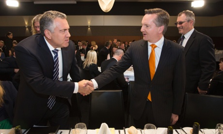 Shadow Treasurer Joe Hockey (left) and Treasurer Chris Bowen shake hands before the Treasurers' Debate at the National Press Club in Canberra, Wednesday, 28 August 2013.