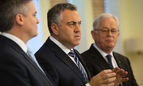 Shadow Treasurer Joe Hockey (centre) speaks at a press conference with Shadow Finance Minister Andrew Robb (right) and Shadow Assistant Treasurer Mathias Cormann, at Parliament House in Canberra, Wednesday, Aug. 28, 2013.