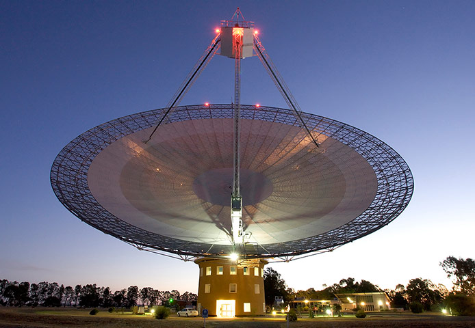A Month in Space: first population of radio bursts known to originate from beyond our galaxy
