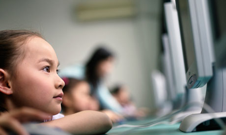 Schoolgirl Working on Computer