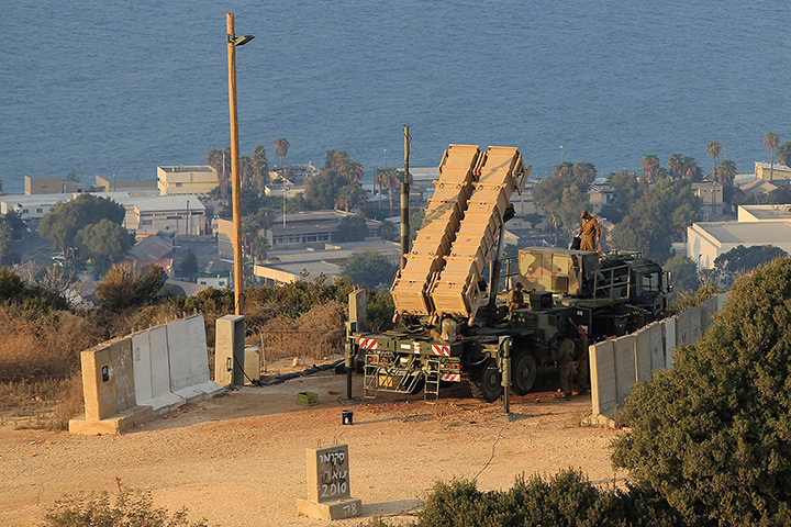 Israel preparations: Israeli soldiers stand next to a Patriot rocket interceptor battery deploye
