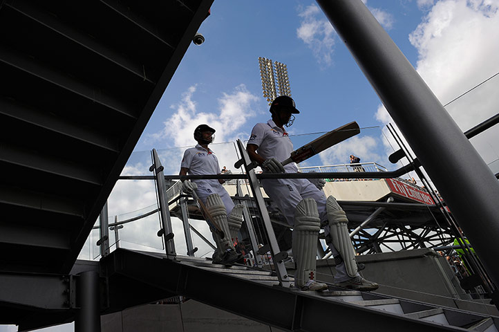 Tom 3rd test day 3: Trott and Cook come down the stairs from the changing room to start play