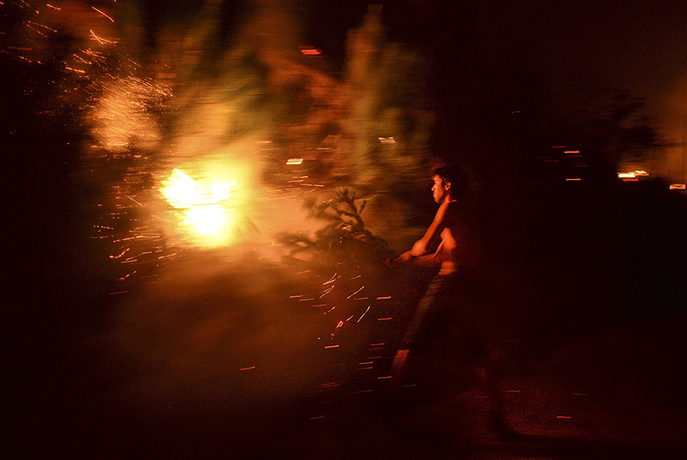 Wildfires in Portugal: A man tries to extinguish a wildfire in Santiago de Besteiros