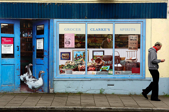 Artworks cover buildings: A well-stocked grocers