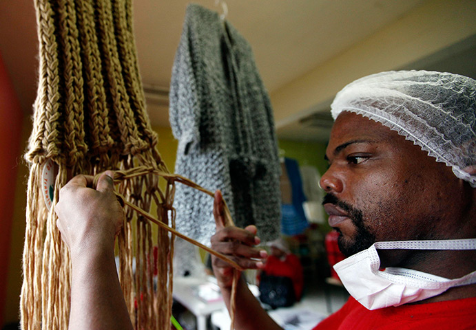 Prison knitting: A prisoner knits for the Doiselles brand of high fashion 