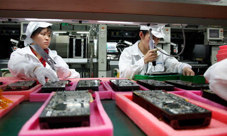 China - Hi Tech Industry - Hon Hai Group's Foxconn plant assembly line workers