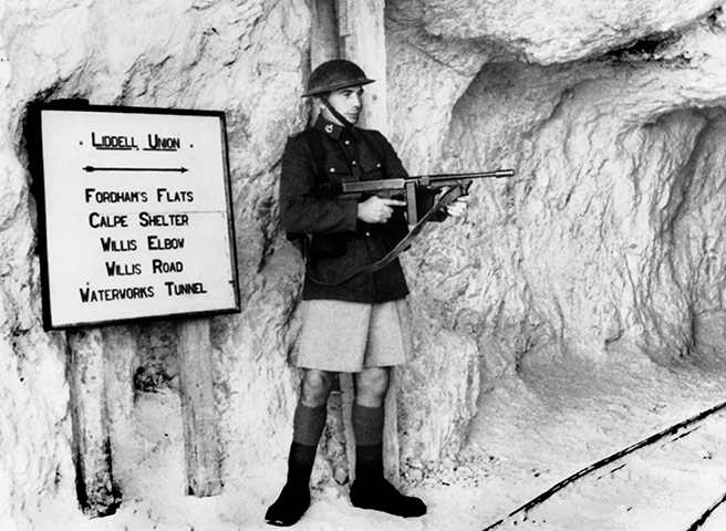 Gibraltar history: A British soldier keeps guard with a Thomson pistol-machine gun