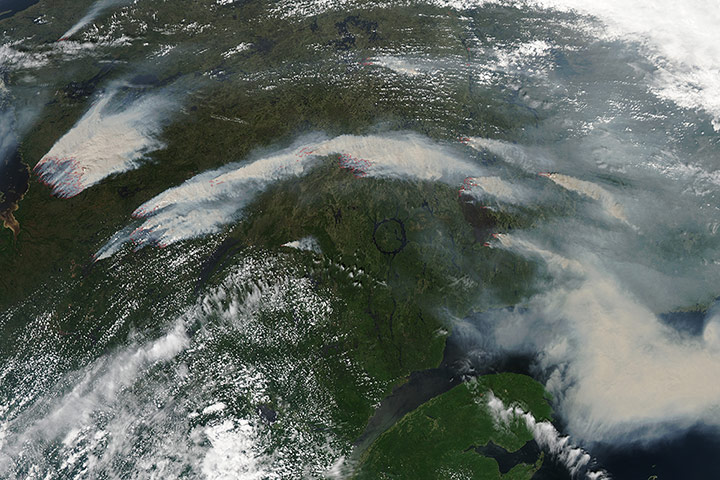 Satelitte Eye on Earth: wildfires burn in western Quebec