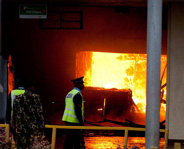 Nairobi airport fire: Policemen near the fire