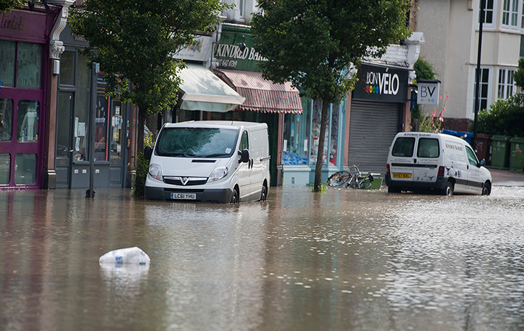 Herne Hill flood: Area around Half Moon Lane in Herne Hill covered in flood water 