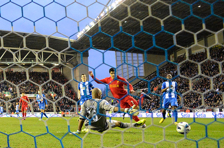 Liverpool's Luis Suárez scores against Wigan Athletic 