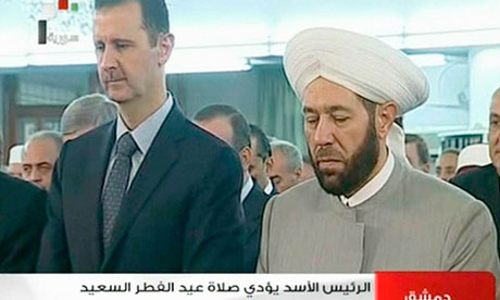 Syrian state television footage showing Bashar al-Assad and the grand mufti in Damascus mosque