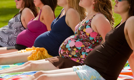 Pregnant women sunbathing