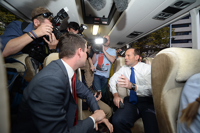 Week 1: Tony Abbott speaks to media on the media bus in Brisbane