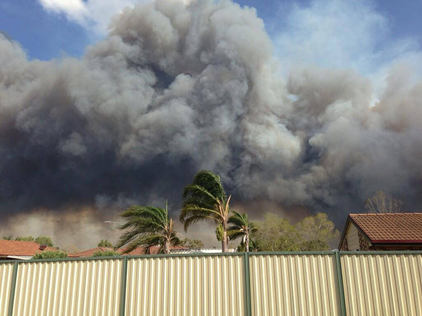 West Sydney bushfires: Smoke from a grass fire at Richmond Rd near Bligh Park in Sydney