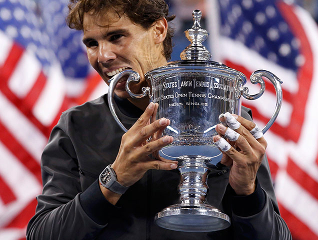tennis: Nadal of Spain bites his trophy
